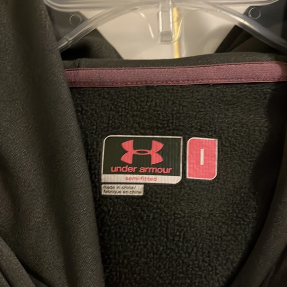 In new condition, under armor olive green with pink camo size large. - Picture 3 of 4